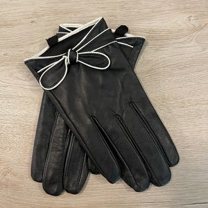 black leather gloves white trim